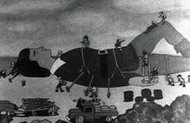 A black and white cartoon image. A white man in a tunic and leggings is lying prone with his eyes shut. Countless, much smaller people, are climbing over him and tying him up. A miniature truck is visible in the front of the image.